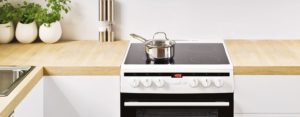 A freestanding cooker in a kitchen set